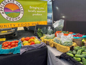 A display of vegetables at a farmers' market.