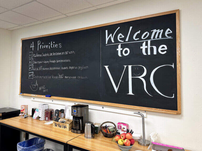 A chalkboard reading Welcome to the VRC