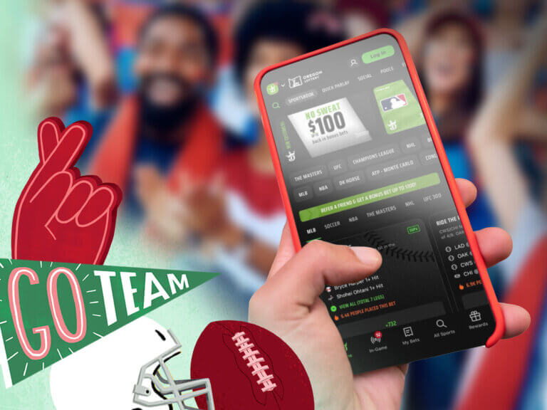 in the foreground, a hand holds a phone open to the DraftKings app, flanked by football-themed illustrations. In the background is a blurred image of people in stadium seats, cheering on a sporting event